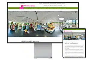 Wilhelma-Shop Webseite wird auf einem Pro Display XDR und daneben auf einem iPad Pro angezeigt